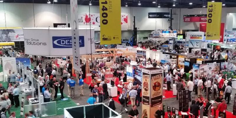 Business activity at a trade show where lot of products and service are being showcased.