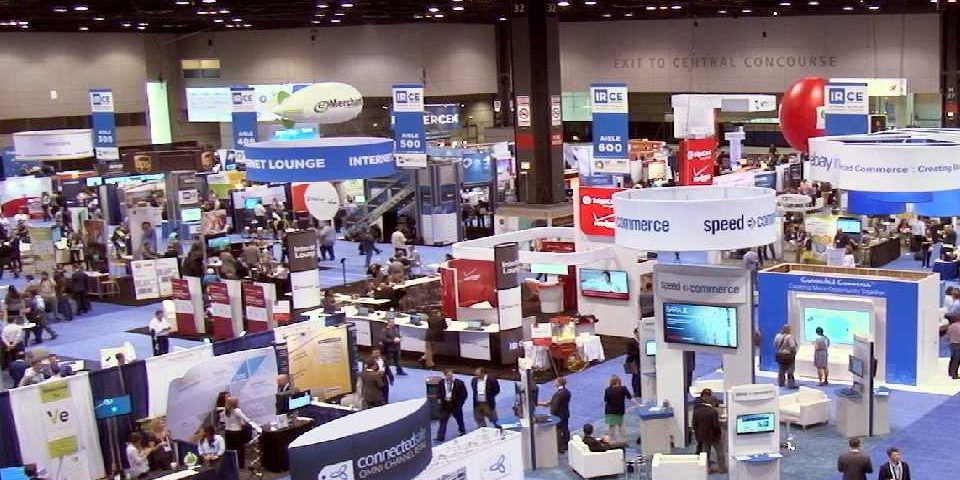 A trade show with lot of participants showcasing their business products and services.