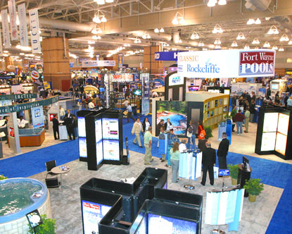 Stalls at trade show, lot of customers visiting the show and business activities happening